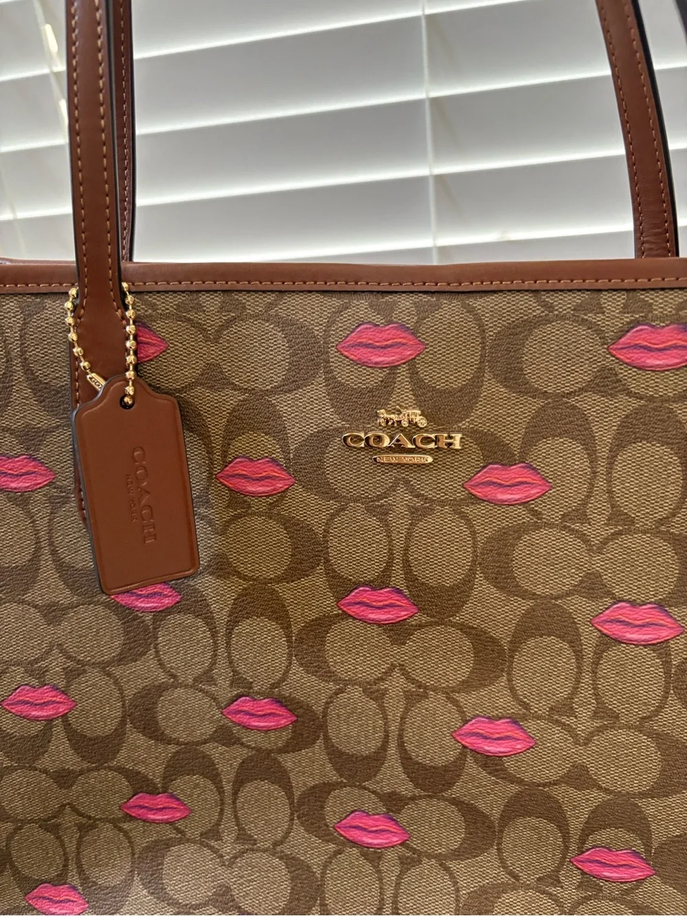 Coach city 33 Brown Signature Tote with Pink Lip Print Accents